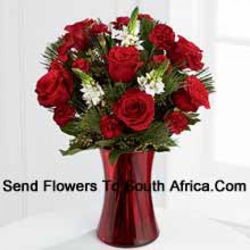 Roses and Assorted Greenery in Red Vase